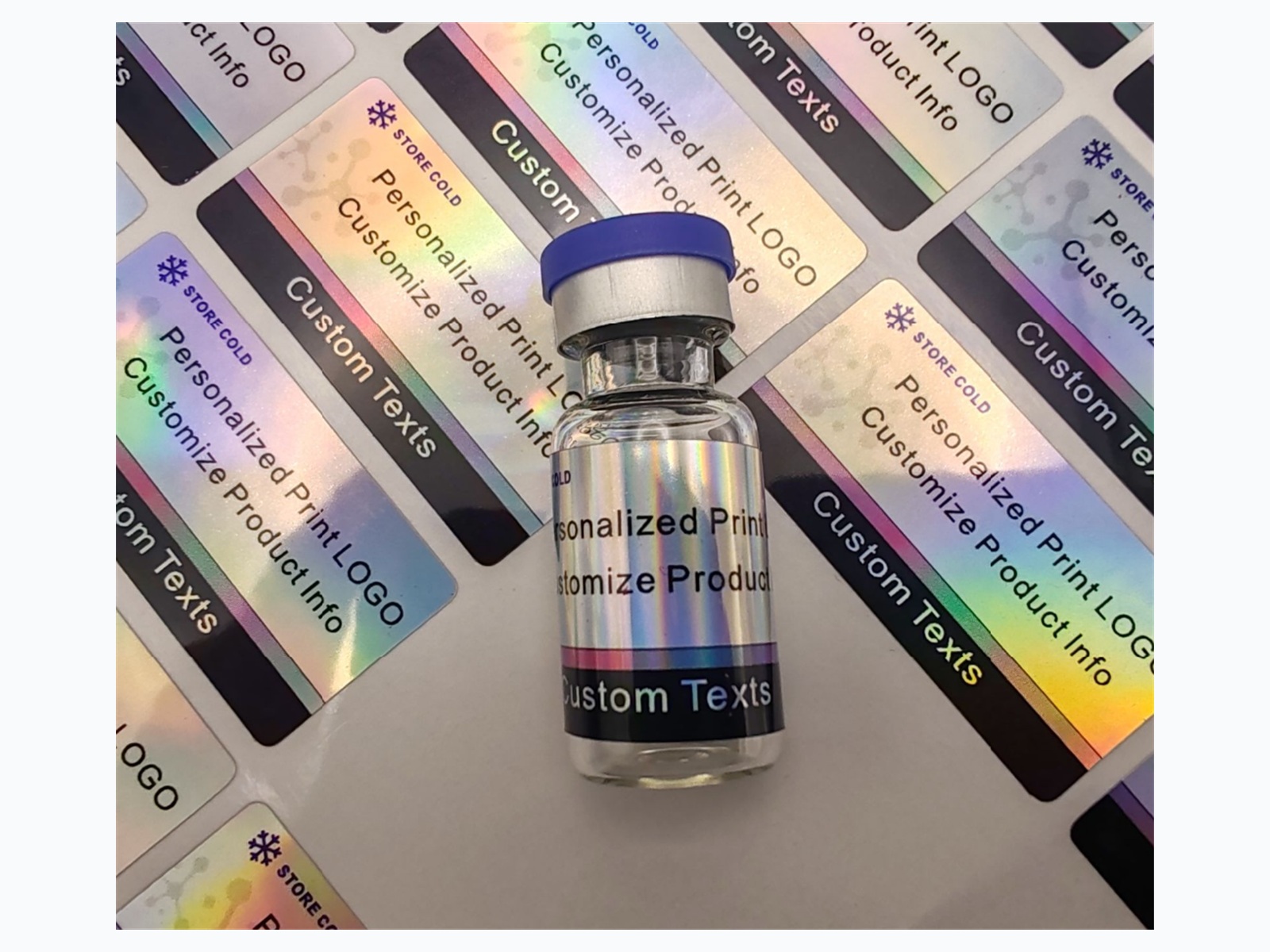 Holographic small bottle label on sheet format